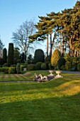 BRODSWORTH HALL, YORKSHIRE: VIEW ACROSS LAWN TO BORDER OF TOPIARY. VICTORIAN, COUNTRY, GARDEN, FORMAL, STATUES, STATUARY