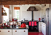 THE FREETH, HEREFORDSHIRE: KITCHEN IN RED, WHITE AND BLACK. AGA, RED TOASTER