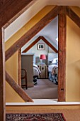 THE FREETH, HEREFORDSHIRE: VIEW THROUGH TO ATTIC TWIN ROOM - BEDS, LAMP, FABRIC CHEST, BEDROOM