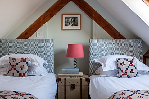 THE_FREETH_HEREFORDSHIRE_ATTIC_TWIN_ROOM__BEDS_LAMP_FABRIC_CHEST_BEDROOM_CUSHIONS_BEDHEADS
