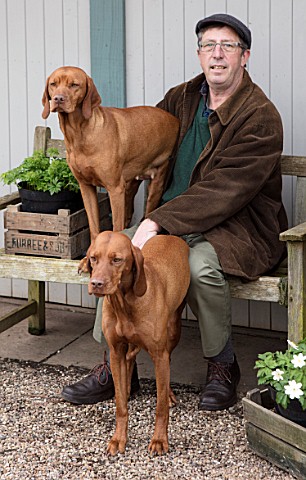 AVONDALE_NURSERIES_COVENTRY_BRIAN_ELLIS_WITH_HIS_TWO_PET_VIZSLA_DOGS_JESS_AND_LILY_AT_THE_NURSERY