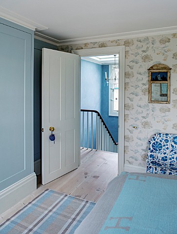 LONDON_HOUSE_DESIGNED_BY_JULIE_SIMONSEN_DOOR_SHOWING_ENTRANCE_TO_BLUE_BEDROOM_WITH_DASH__ALBERT_CHEC