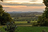 MORTON HALL, WORCESTERSHIRE: VIEW WEST AT SUNSET TO ABBERLEY HILLS. EVENING, BORROWED, LANDSCAPE, VISTA