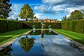 HAZELBY HOUSE, BERKSHIRE: SUMMER, YEW, HEDGES, HEDGING, POND, POOL, WATER, FORMAL, GARDEN, STATUE, REFLECTIONS, REFLECTED