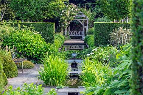 WOLLERTON_OLD_HALL_SHROPSHIRE_RILL_CANAL_WOODEN_PERGOLA_ARBOUR_BENCH_SEAT_POOL_RECTANGULAR_WATER_HED