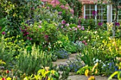 MORTON HALL, WORCESTERSHIRE: SOUTH GARDEN: BORDERS WITH NICOTIANA LIME GREEN, COSMOS SONATA WHITE, PINK, CARMINE, ECHIUM VULGARE WHITE BEDDER, BLUE BEDDER, ZINNIA PURPLE PRINCE