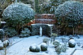 MORTON HALL GARDENS, WORCESTERSHIRE: VIEW DOWN ONTO SOUTH GARDEN. STATUE, HEDGES, HEDGING. NOVEMBER, FROST, COLD, TOPIARY, CLIPPED, ENGLISH, COUNTRY, GARDEN