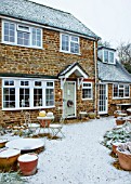 THE CONIFERS, OXFORDSHIRE: FRONT GARDEN IN SNOW. DESIGNER CLIVE NICHOLS. WINTER, DECEMBER, COLD, COURTYARD, HOUSE, FRONT, DOOR