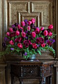 PARHAM HOUSE AND GARDENS, SUSSEX: FLOWER ARRANGEMENT WITH TULIPA BLACK HERO, TULIPA CAPE HOLLAND, HONESTY AND ACANTHUS. SPRING, CUTTING