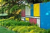 THE MANOR HOUSE, STEVINGTON, BEDFORDSHIRE: SPRING. MONDRIAN WALL, ART, PAINTED, WALLS YELLOW, BLUE, RED, WHITE