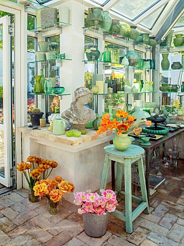 CLAUS_DALBY_GARDEN_DENMARK_GREENHOUSE_STUDIO__STATUE_EMPTY_CONTAINERS_FOR_FLOWER_ARRANGING_IN_GREEN_