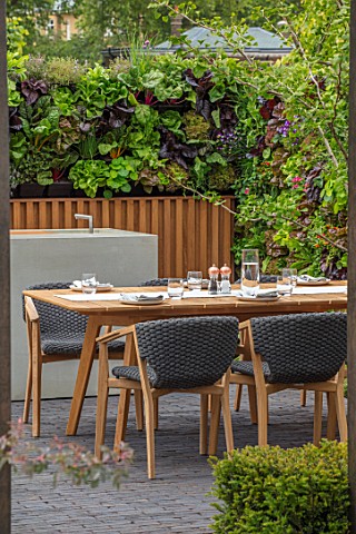CHELSEA_FLOWER_SHOW_2018_URBAN_FLOW_GARDEN_DESIGNER_TONY_WOODS_TABLE_CHAIRS_PATIO_LIVING_WALL_KITCHE