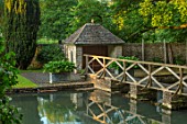 ABLINGTON MANOR, GLOUCESTERSHIRE: REFLECTIONS IN RIVER COLN, LAWN, SUMMERHOUSE, SUMMER HOUSE, WOODEN BRIDGE, SUMMER, GREEN, GARDEN, ENGLISH, COUNTRY