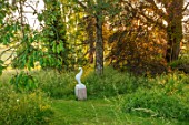 ASTHALL MANOR, OXFORDSHIRE: SUNRISE, LAWN, TREES, MEADOW, SCULPTURE CREATURA BY JAYA SCHUERCH