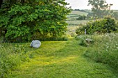 ASTHALL MANOR, OXFORDSHIRE: STEPS, LAWN, MEADOW, COUNTRYSIDE BEYOND, ENGLISH, COUNTRY, GARDEN, SUMMER