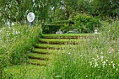 ASTHALL MANOR, OXFORDSHIRE: LAWN, TURF, STEPS, SCULPTURE BY LUKE DICKINSON. GREEN, ENGLISH, COUNTRY, GARDEN, SLOPES, SLOPING, STAIRCASE