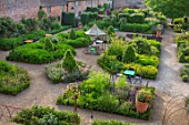 THE WALLED GARDEN AT COWDRAY, WEST SUSSEX: PATHS, BORDERS, GAZEBO, SUMMERHOUSE, SEATING, GRAVEL, GREEN, ENGLISH, COUNTRY, GARDEN. SUMMER