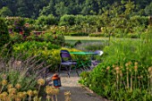 THE WALLED GARDEN AT COWDRAY, WEST SUSSEX: PATHS, BOX PARTERRE, BORDERS, FLOWERS, ENGLISH, COUNTRY, GARDEN, TABLE, CHAIRS