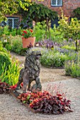 THE WALLED GARDEN AT COWDRAY, WEST SUSSEX: GRAVEL PATH, BORDERS, LION STATUE, HEUCHERA, ENGLISH, COUNTRY, GARDENS, SUMMER