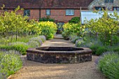 THE WALLED GARDEN AT COWDRAY, WEST SUSSEX: ENGLISH, COUNTRY, GARDEN, BORDERS OF LAVENDER, RAISED BRICK POOL, POND, WATER FEATURE, THALICTRUM GLAUCUM, PATHS