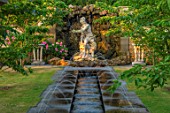 MALVERLEYS, HAMPSHIRE: SUMMER, RILLS, CANAL, WATER, FOUNTAINS, GROTTO BY SIMON PETIFER, NEPTUNE STATUE, FORMAL, GARDEN, VISTA, FOCAL POINT, ROSES