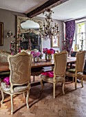 PYTTS HOUSE, OXFORDSHIRE: THE DINING ROOM. DINING TABLE, CHAIRS, CANDELABRAS, MIRROR