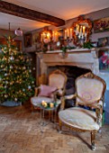 PYTTS HOUSE, OXFORDSHIRE: CHRISTMAS, CLASSIC DINING ROOM, CANDLES, CHAIRS, CHRISTMAS TREE, FIREPLACE
