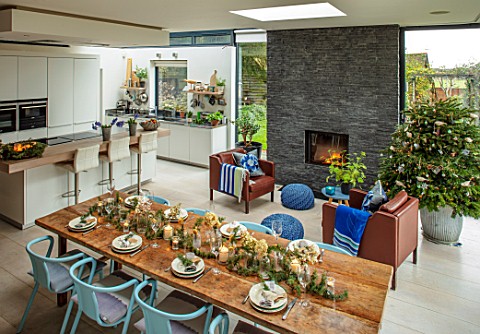 SPRINGFIELDS_HOUSE_WEST_CLANDON_SURREY_OPEN_PLAN_KITCHEN_DINING_ROOM_SLATE_WALL_FIREPLACE_KITCHEN_IS