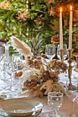 MARBURY HALL, SHROPSHIRE: DESIGNER SOFIE PATON-SMITH - DINING ROOM, VICTORIAN CHRISTMAS, DINING TABLE, CANDLES, DECORATION, DRIED FLOWERS, PENNY CRESS, NIGELLA, PAMPAS GRASS
