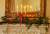 MARBURY HALL, SHROPSHIRE: DESIGNER SOFIE PATON-SMITH - TAPESTRY DINING ROOM, SWEDISH CHRISTMAS -MANTELPIECE WITH CANDLES, MIRROR