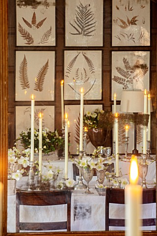 WARDINGTON_MANOR_OXFORDSHIRE_FLORIST_SHANE_CONNOLLY__DINING_ROOM_REFLECTION_IN_MIRROR__CANDLES_VASES