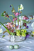 MARBURY HALL, SHROPSHIRE: DESIGNER SOFIE PATON-SMITH, BLUE DINING ROOM, WHITE TABLE CLOTH, SPRING FLOWERS IN VASES, HELLEBORES, DAFFODILS, ANEMONES, EASTER EGGS
