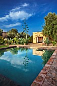 TAROUDANT, MOROCCO: DESIGNERS ARNAUD MAURIERES AND ERIC OSSART: PRIVATE GARDEN - SWIMMING POOL, TERRACE, CACTUS, APRIL, AFRICA