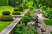 WINSON MANOR, GLOUCESTERSHIRE: LAWN, RAISED BED, YEW TOPIARY ON LAWN, CATALPA, STATUES, WALLS, SUMMER, BORDERS