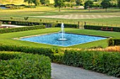 THE NEWT IN SOMERSET: VIEW TO BATHING POND, FOUNTAIN, HORNBEAM HEDGES, JULY, ENGLISH, COUNTRY, GARDENS