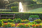 THE NEWT IN SOMERSET: VIEW TO BATHING POND, FOUNTAIN,, FROM KITCHEN GARDEN, POTAGER, SEAT, SEATING, NASTURTIUMS, JULY, ENGLISH, COUNTRY, GARDENS