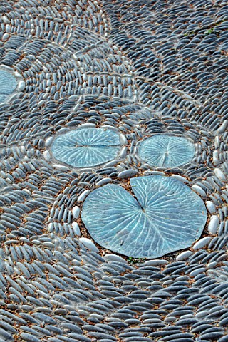 THE_NEWT_IN_SOMERSET_PEBBLE_TERRACE_DETAIL_LILY_PADS_SET_IN_FLOOR_ORNAMENT_FLOORING_PATHS