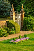 CANONS ASHBY, NORTHAMPTONSHIRE, THE NATIONAL TRUST - WALL, GATE, LAWN, BEDDING, BEDS, EVENING, JULY, ENGLISH, COUNTRY, GARDEN