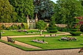 ANONS ASHBY, NORTHAMPTONSHIRE, THE NATIONAL TRUST - LAWN, BEDDING, GRAVEL PATHS, CLIPPED TOPIARY YEWS, WALL, GATE, JULY