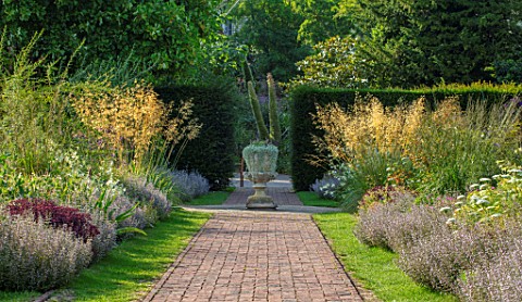 GLYNDEBOURNE_EAST_SUSSEX_PATH_BORDERS_URN_STONE_CONTAINER_STIPA_GIGANTEA