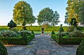 MITTON MANOR, SHROPSHIRE: FRONT GARDEN. BOX HEDGES, LAWN, FOUNTAIN, TREES, FORMAL, ENGLISH, COUNTRY, GARDENS