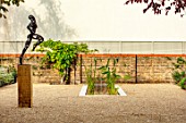 DESIGNER ANTHONY PAUL: SMALL, TOWN, FORMAL, GRAVEL, WATER FEATURE, POOL, POND, CANAL, LONDON, WALL, TRELLIS, PATIO, SCULPTURE, WALLS