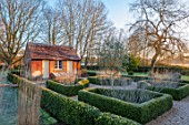ST TIMOTHEE, BERKSHIRE - FOSTY, CLIPPED TOPIARY BOX PARTERRE, PEROVSKIA, OLIVE TREE, OUTBUILDING, WINTER, JANUARY, FROST, ENGLISH, COUNTRY, GARDEN