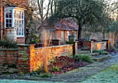 ST TIMOTHEE, BERKSHIRE - WALL, HEUCHERA, SEDUMS, HOUSE, TERRACOTTA CONTAINER, WINTER, JANUARY, FROST, FROSTY, ENGLISH, COUNTRY, GARDEN