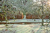 BRYANS GROUND, HEREFORDSHIRE - WINTER GARDEN, FROST, FROSTY, SERPENTINE CANAL, JANUARY, WATER, REFLECTED, REFLECTIONS, HEDGE, HEDGING, BEECH, VISTA, FRUIT TREES