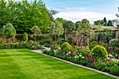 MORTON HALL GARDENS, WORCESTERSHIRE: THE SOUTH GARDEN, LAWN, BORDER WITH TULIPS, SPRING, APRIL, WALLED GARDENS