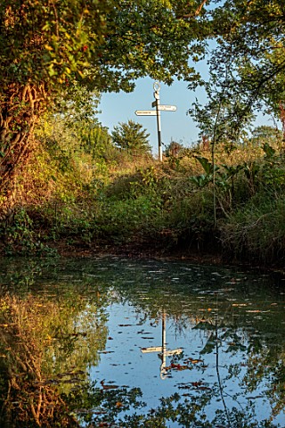 PRIORS_MARSTON_WARWICKSHIRE_POND_POOL_SEPTEMBER_EVENING_LIGHT_REFLECTED_REFLECTIONS_SIGNPOST