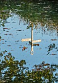 PRIORS MARSTON, WARWICKSHIRE: POND, POOL, SEPTEMBER, EVENING LIGHT, REFLECTED, REFLECTIONS, SIGNPOST