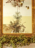 MARBURY HALL, SHROPSHIRE: DESIGNER SOFIE PATON-SMITH - DINING ROOM, CHRISTMAS, FIREPLACE, GARLAND OF HOPS, MIRROR, CLOUD REFLECTION, DECEMBER