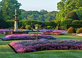 BRODSWORTH HALL, YORKSHIRE: SUMMER, CLIPPED TOPIARY HEDGES, HEDGING, BEDDING, LAWN, FORMAL BEDDING, TREES, VICTORIAN, FOUNTAIN